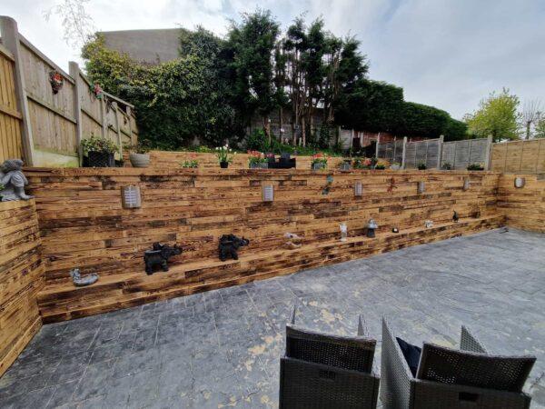 funky timber reclaimed scorched pallet wood in garden